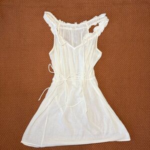J. Crew White 100% cotton mini dress / coverup with ruffles and tie waist.